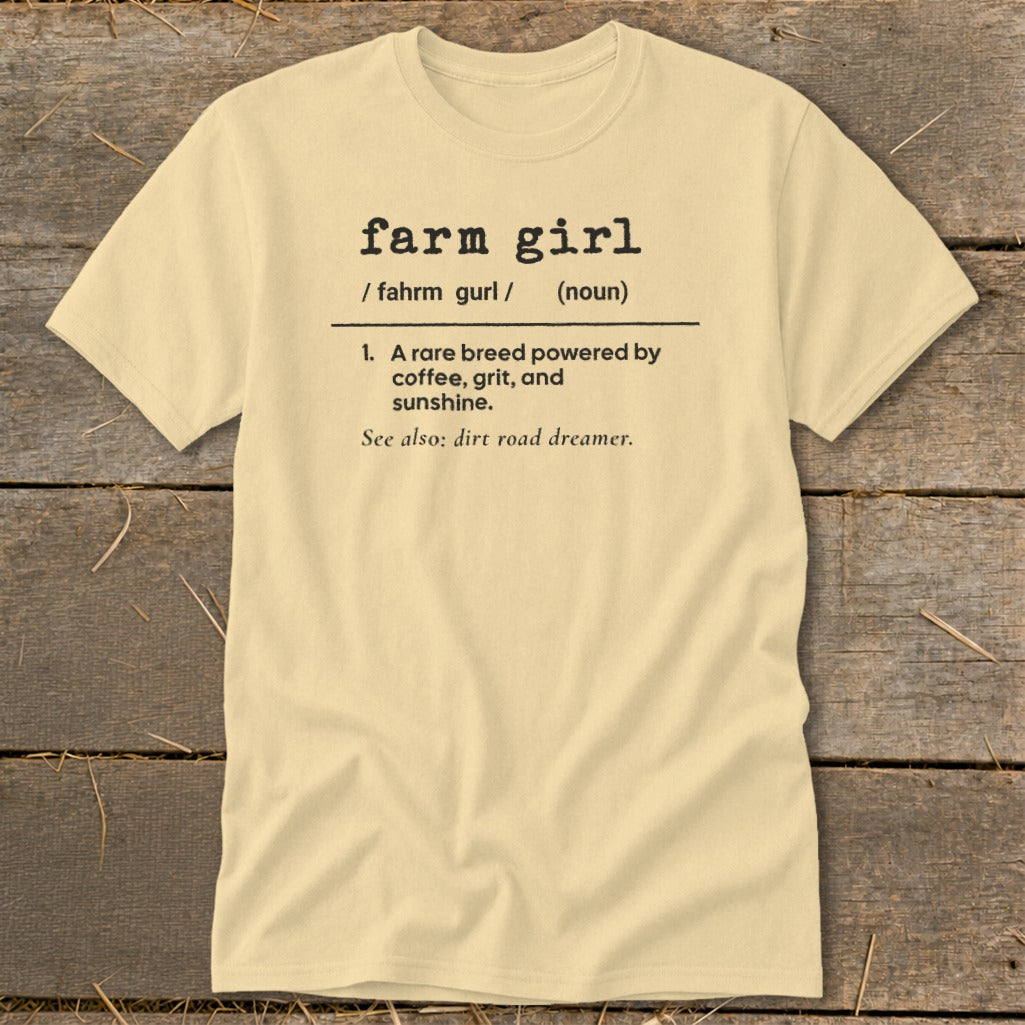 Light yellow t-shirt with "farm girl" definition printed in black text.