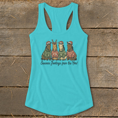 Turquoise tank top with four horses wearing Christmas sweaters and Santa hats.
