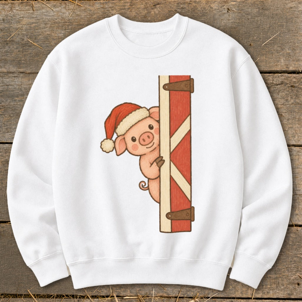 White sweatshirt with a cute pig wearing a Santa hat peeking around a barn door.