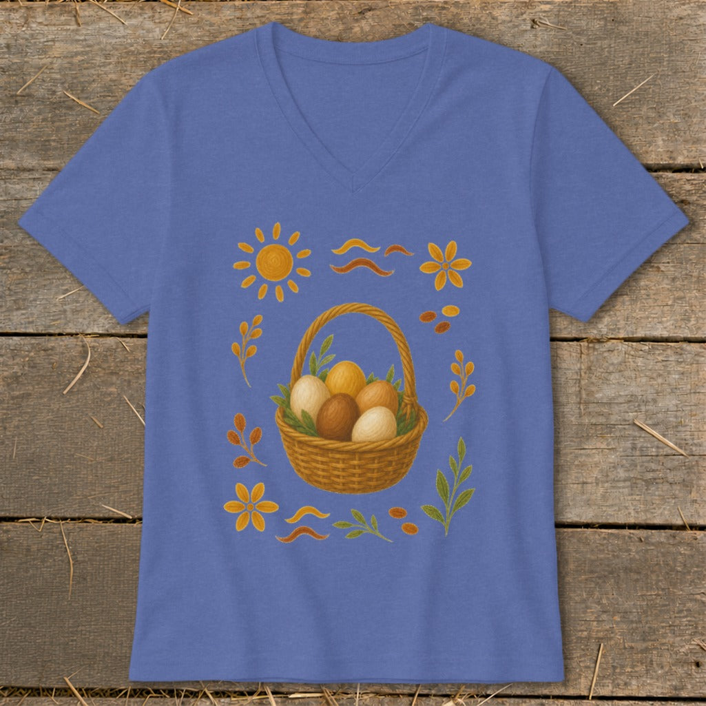 V-neck t-shirt with Easter basket, eggs, sun, flowers, and leaves design.