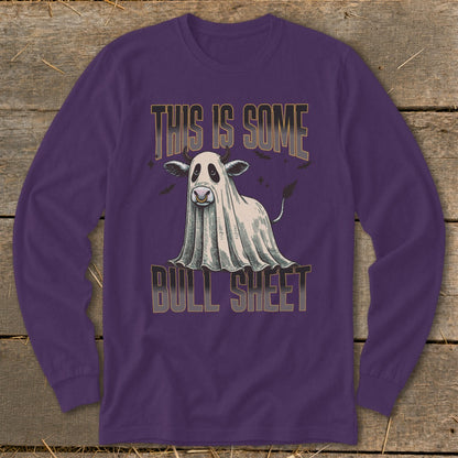 Purple long-sleeve shirt with a cow dressed as a ghost and text.