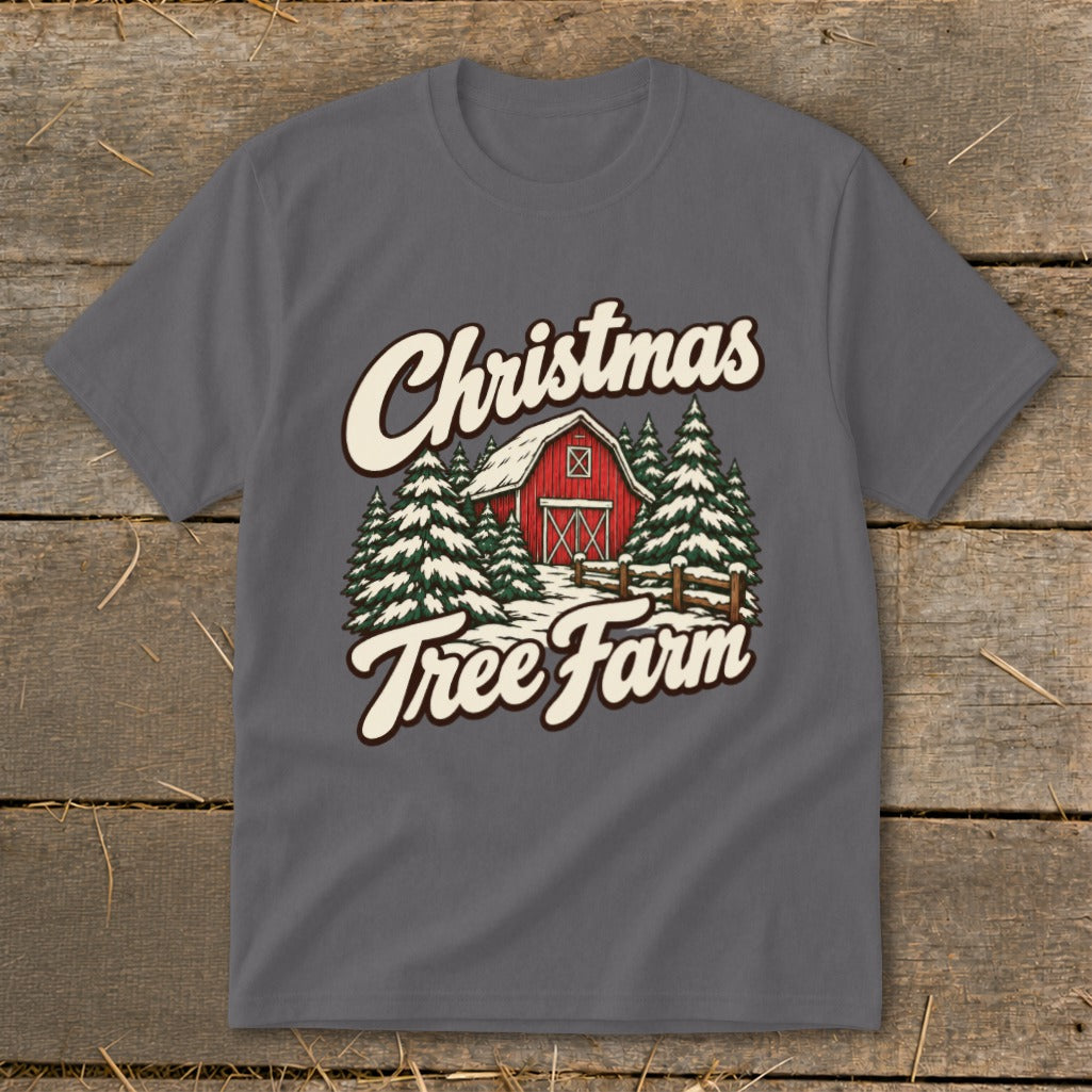 Christmas Tree Farm graphic on a charcoal grey t-shirt with a barn and pine trees.