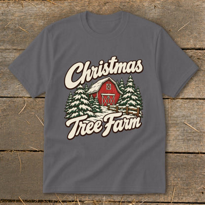 Christmas Tree Farm graphic on a charcoal grey t-shirt with a barn and pine trees.