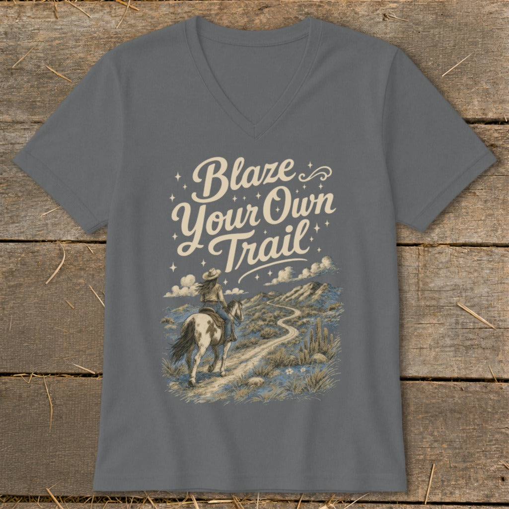 Gray t-shirt with "Blaze Your Own Trail" text and a woman riding a horse on a mountain path.