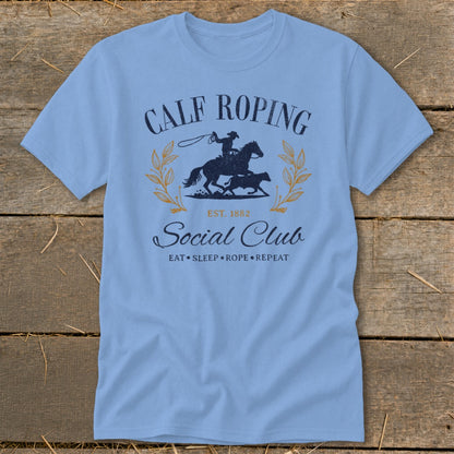 Light blue t-shirt with calf roping graphic and "Social Club" text.