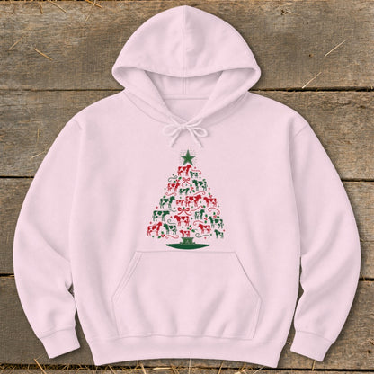 Pink hoodie with a Christmas tree design made of red and green cows.