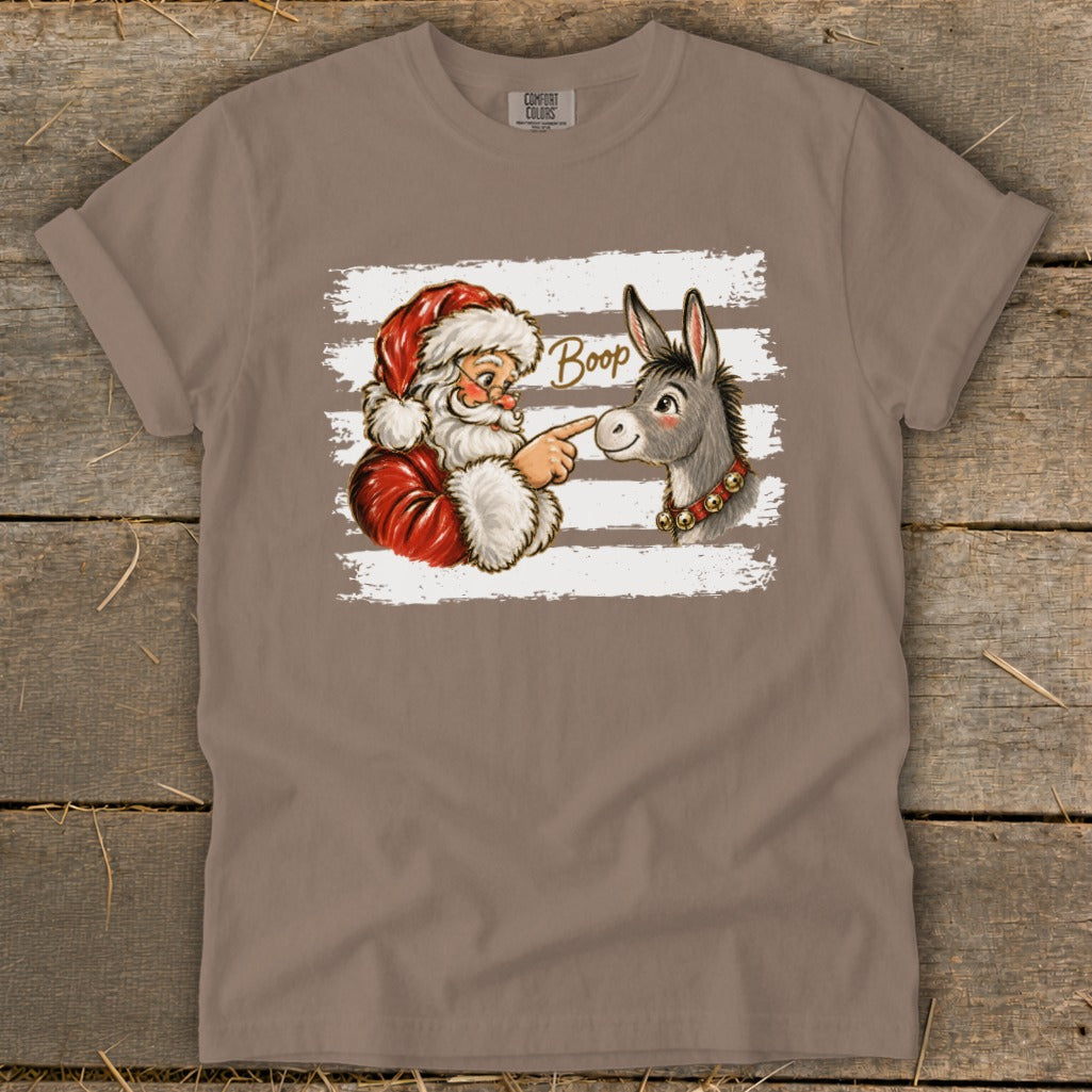 Santa booping a donkey with the word "Boop" on a taupe shirt.