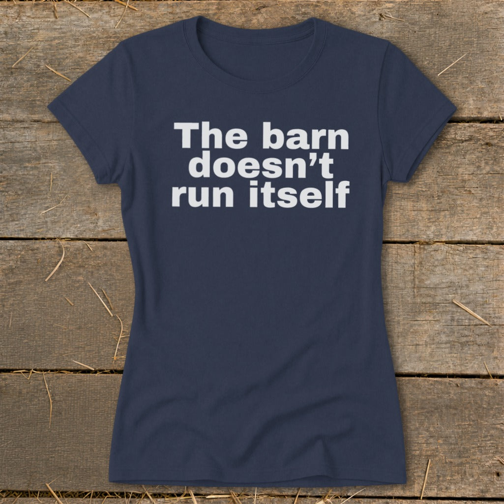 Navy t-shirt with white text that reads "The barn doesn't run itself".