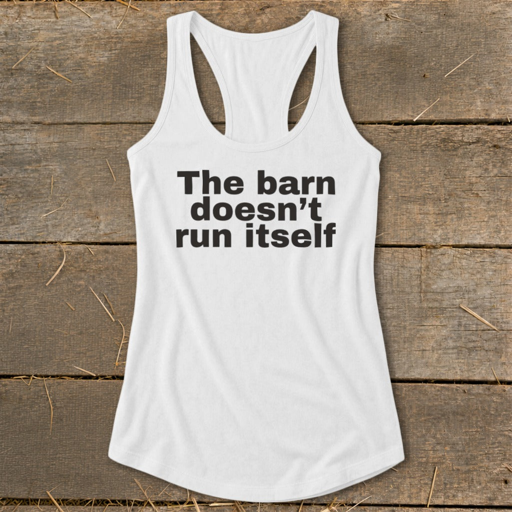 White racerback tank top with black text that reads "The barn doesn't run itself."