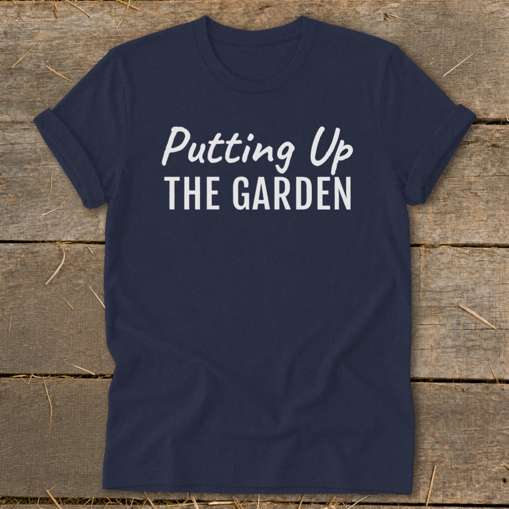 Navy t-shirt with white text reading "Putting Up THE GARDEN".