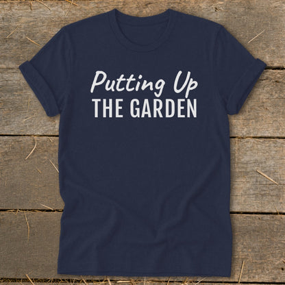 Navy t-shirt with white text reading "Putting Up THE GARDEN".