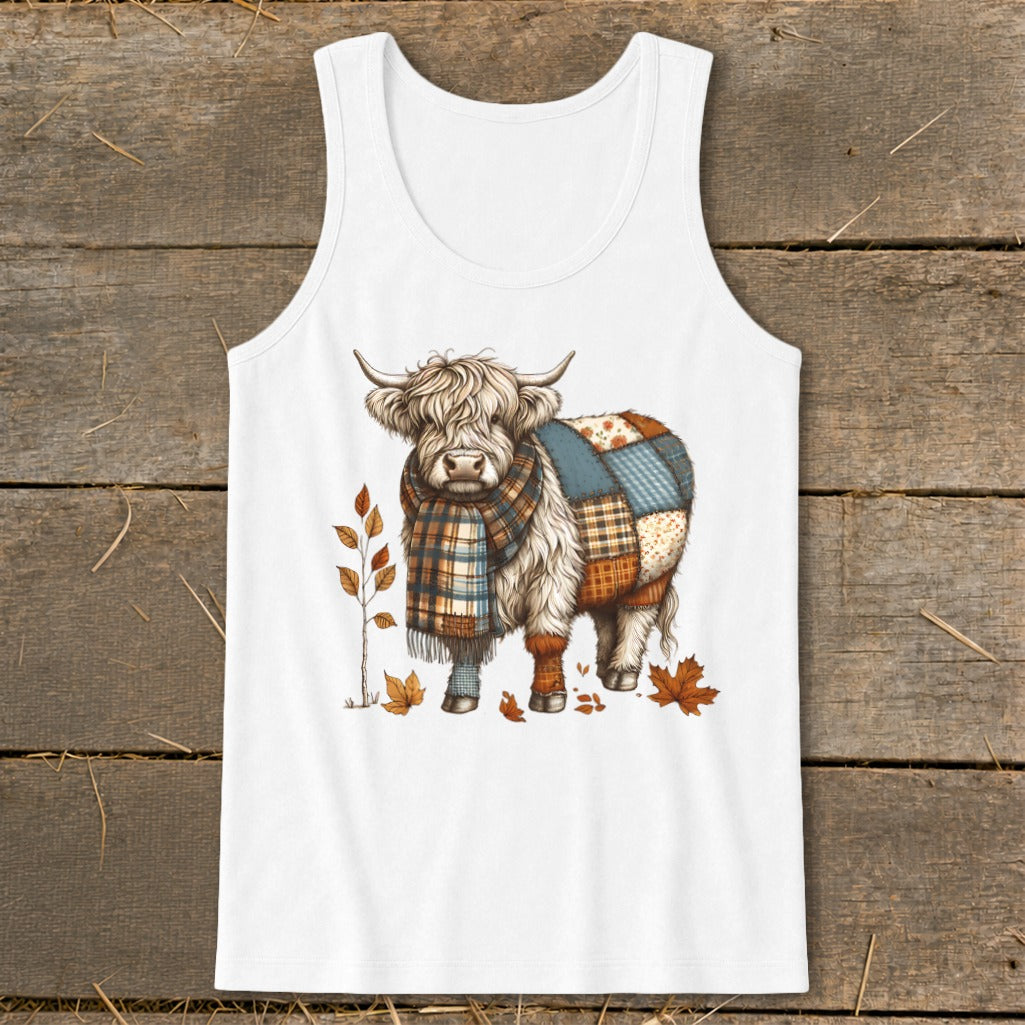 White tank top with a Highland cow graphic wearing a scarf and leg warmers.