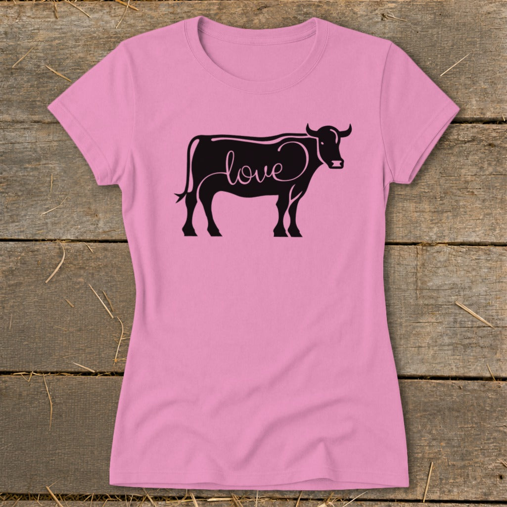 Pink t-shirt with a black cow silhouette filled with the word "love".