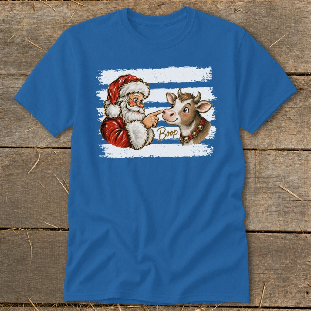 Santa booping a cow with the word "Boop" on a blue t-shirt.