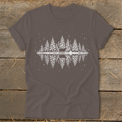 Brown t-shirt with white graphic of trees, a guitar, and reflections.