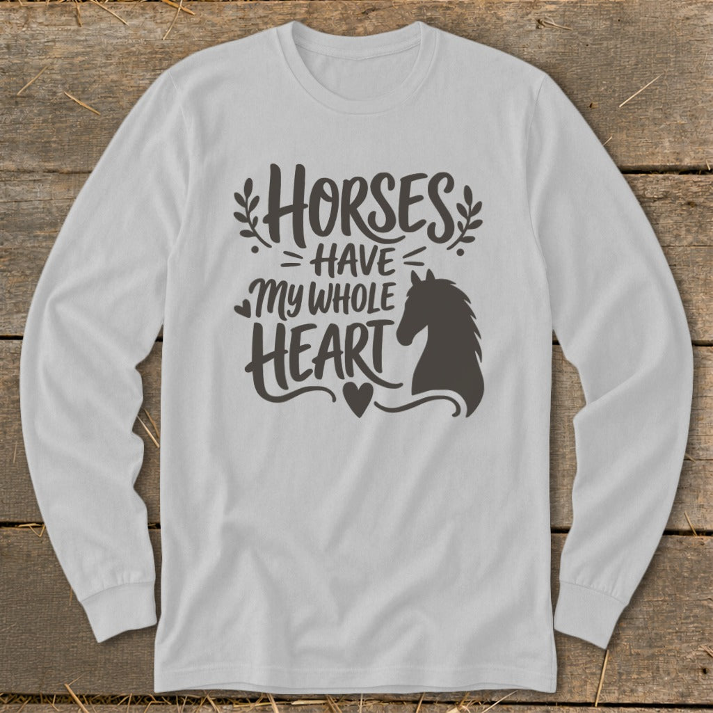 White long-sleeve shirt with dark grey text and horse silhouette reading "Horses Have My Whole Heart".