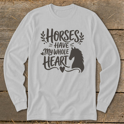 White long-sleeve shirt with dark grey text and horse silhouette reading "Horses Have My Whole Heart".