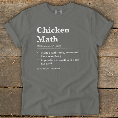 Grey t-shirt with white text defining "Chicken Math."