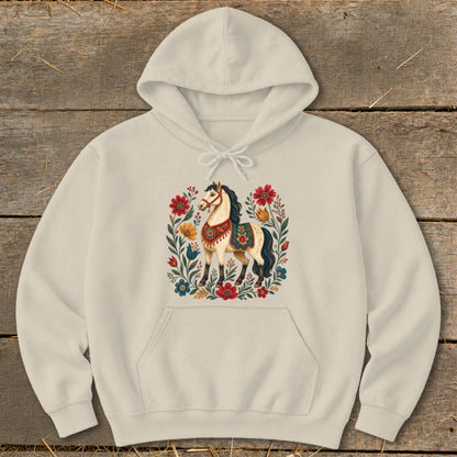 Cream hoodie with a decorative horse and floral wreath graphic on the front.