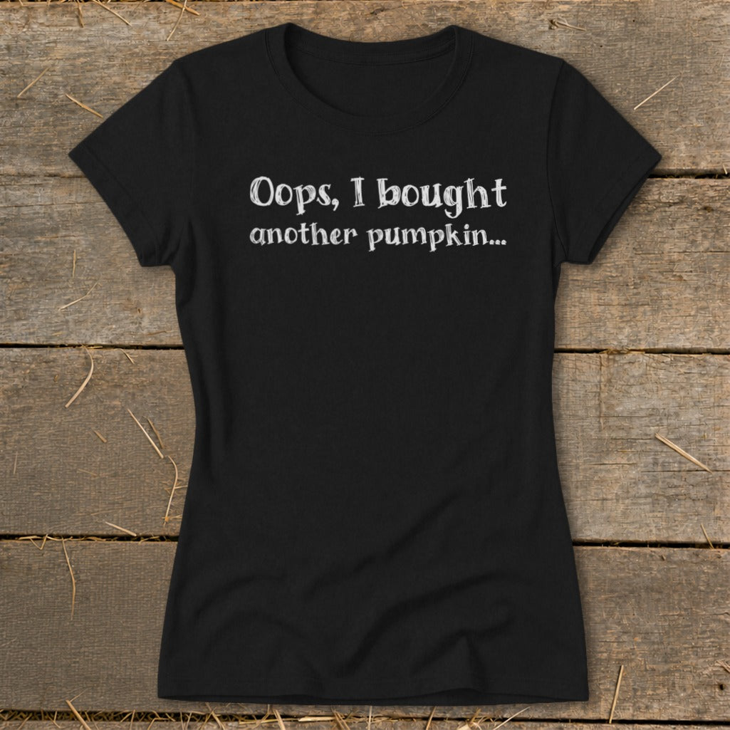 Black t-shirt with white text "Oops, I bought another pumpkin..."