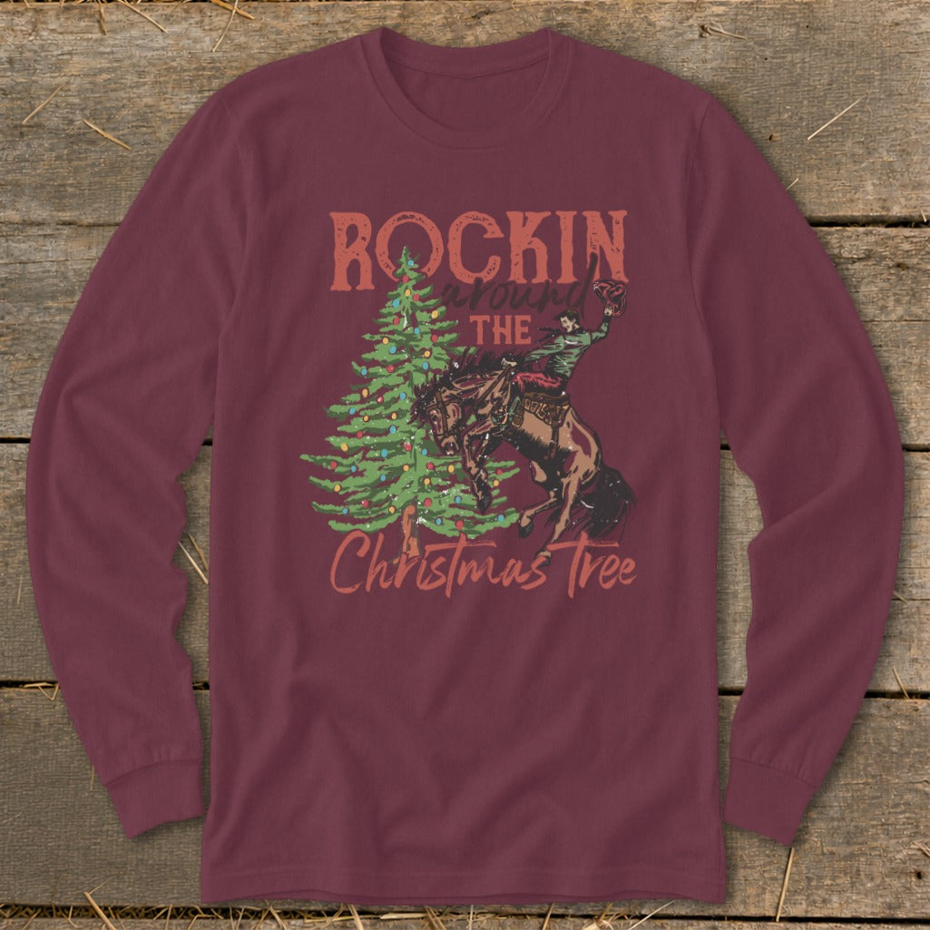 Maroon long sleeve shirt with "Rockin Around The Christmas Tree" and bucking bronco graphic.