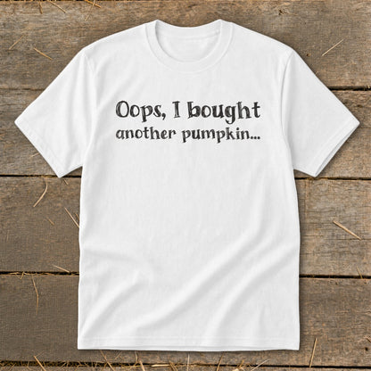 White t-shirt with black text "Oops, I bought another pumpkin..."
