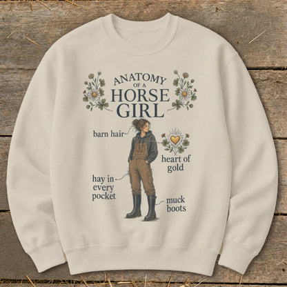 Cream sweatshirt with "Anatomy of a Horse Girl" graphic and text.