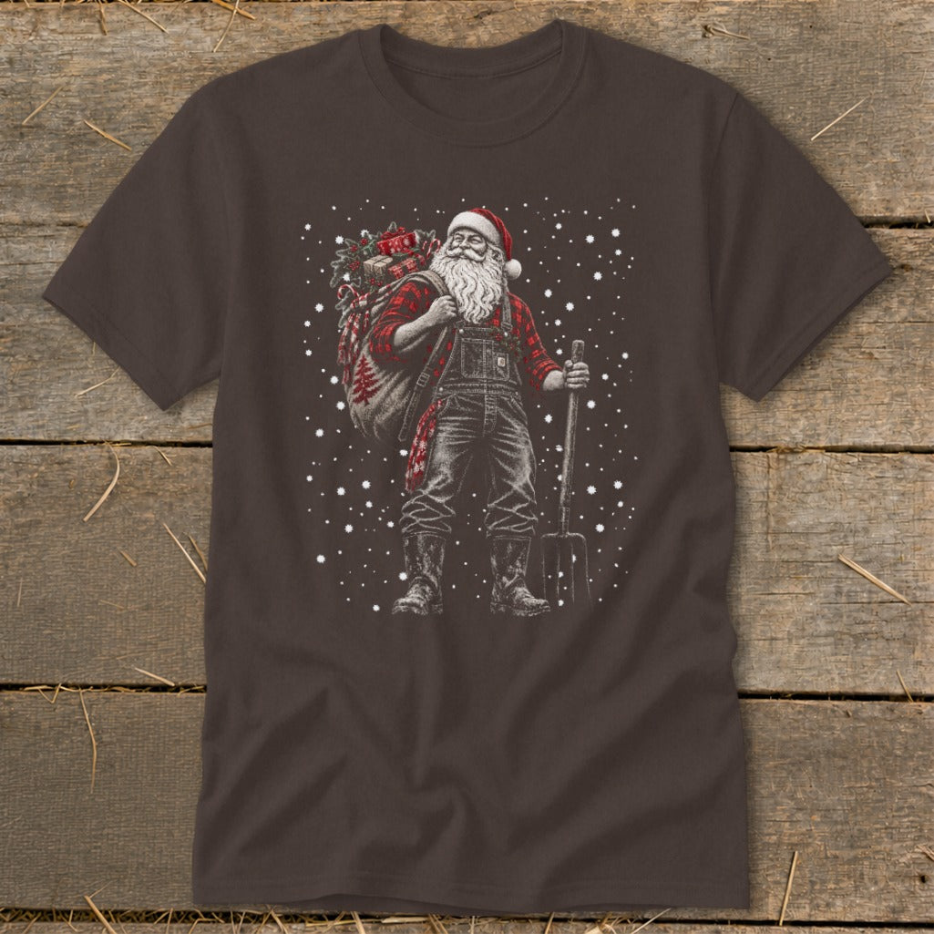 Santa Claus in overalls and plaid shirt carries a sack of gifts and a pitchfork.