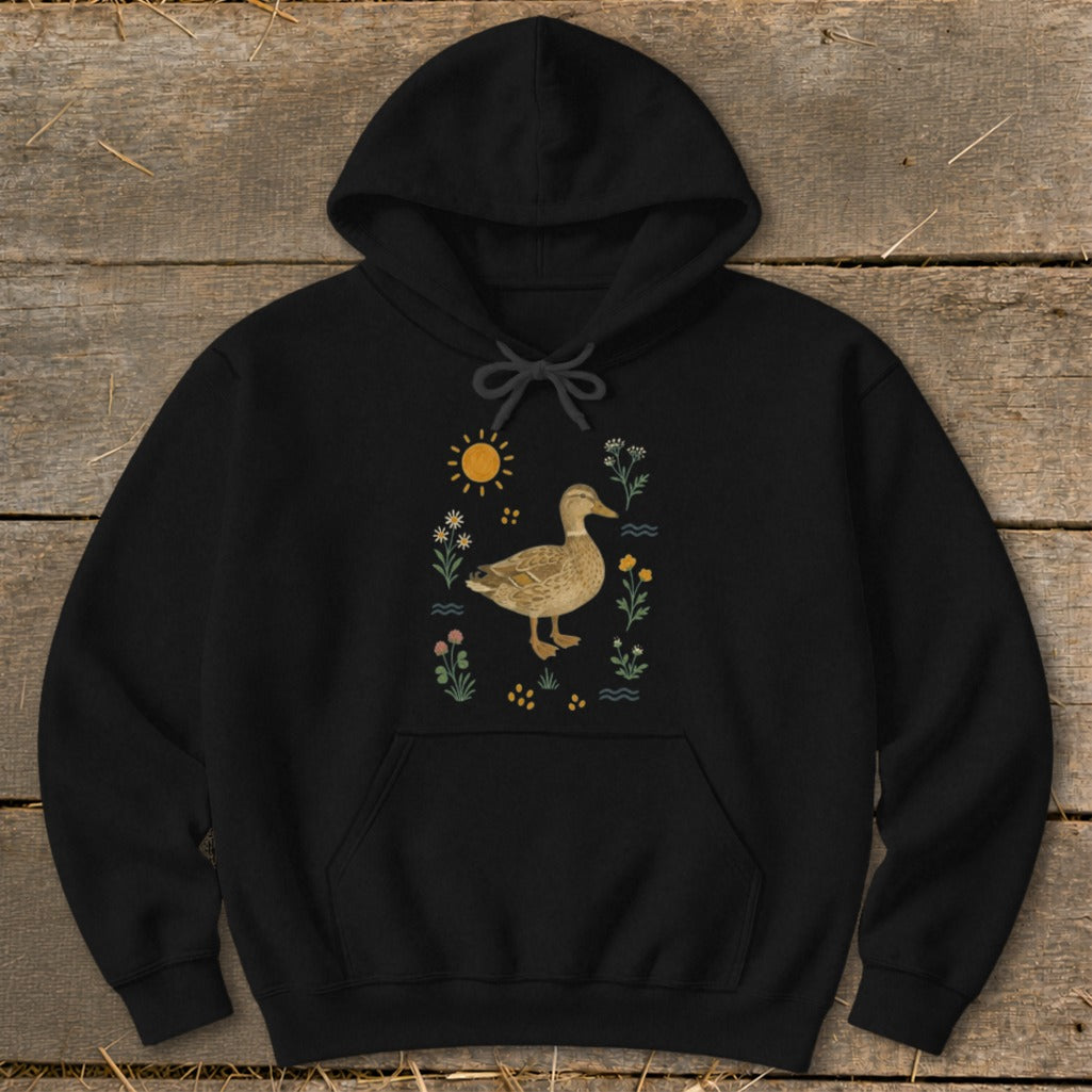 Black hoodie with a graphic of a duck surrounded by flowers and a sun.