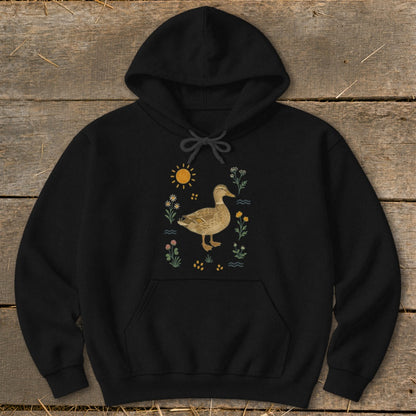Black hoodie with a graphic of a duck surrounded by flowers and a sun.