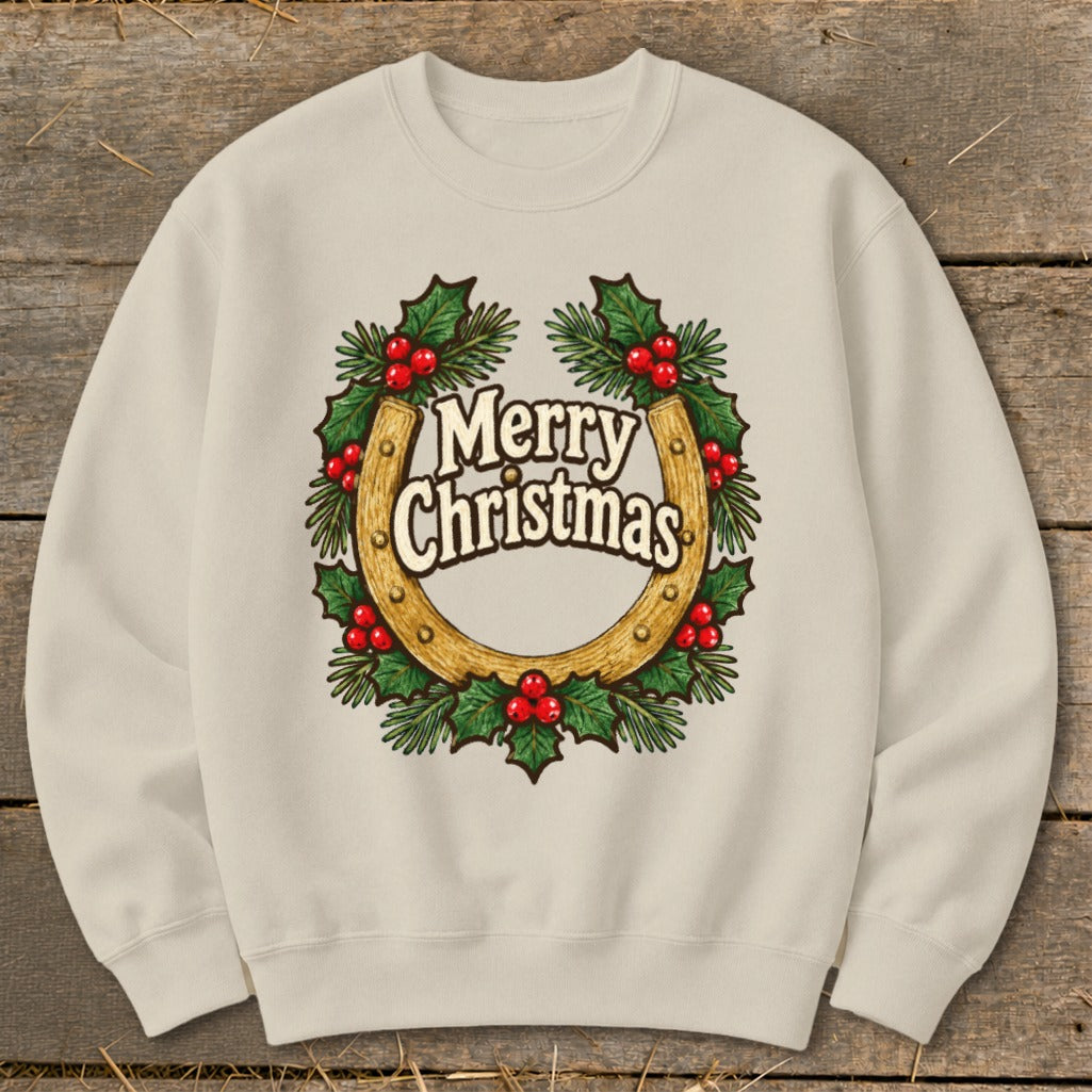 Crewneck sweatshirt with a golden horseshoe surrounded by holly and red berries, reading "Merry Christmas".
