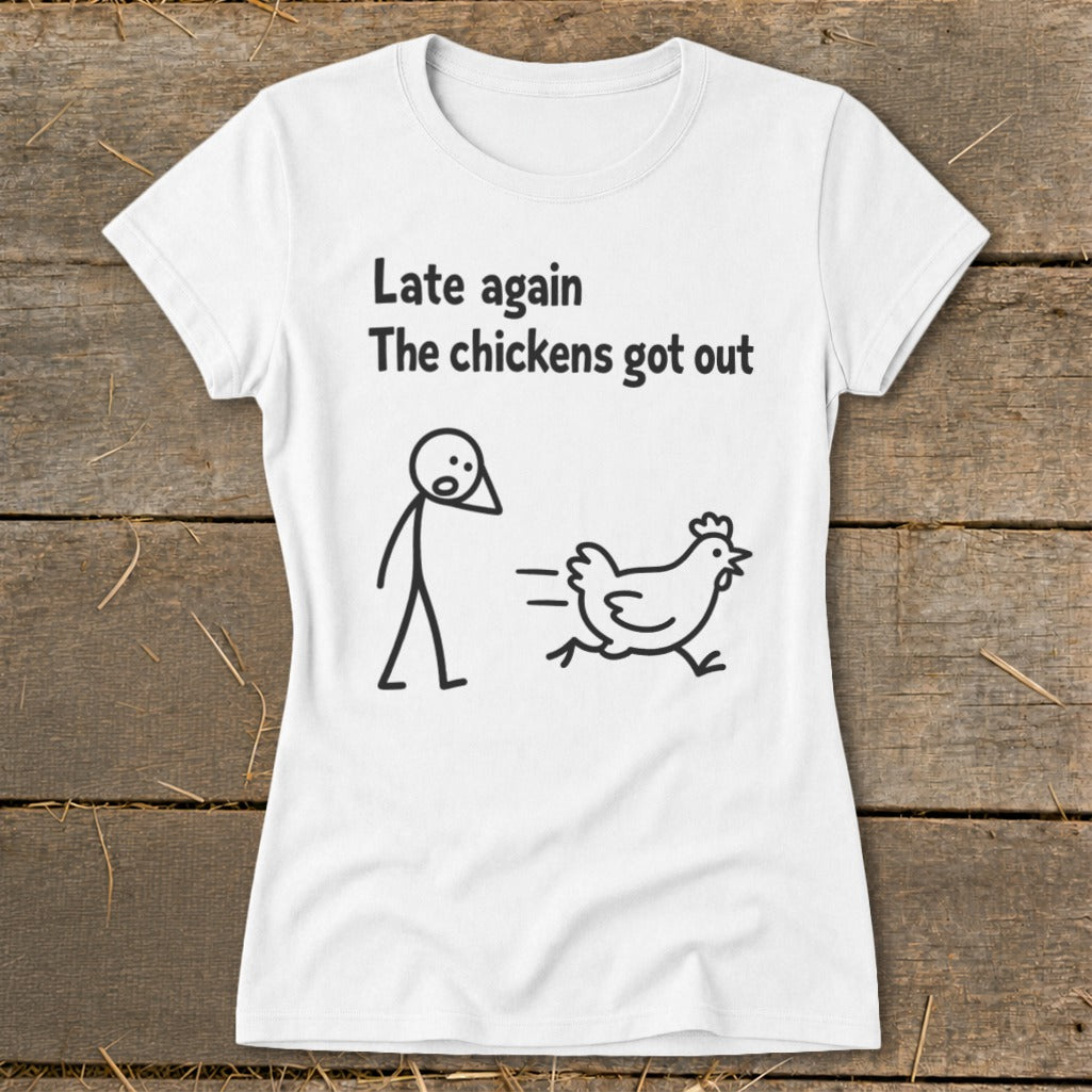 White t-shirt with black text and drawing of stick figure and chicken.