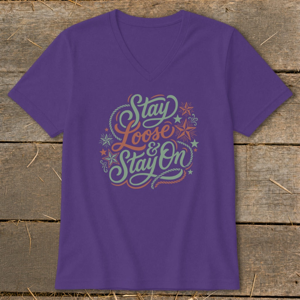 Purple v-neck t-shirt with "Stay Loose & Stay On" graphic with rope and star accents.