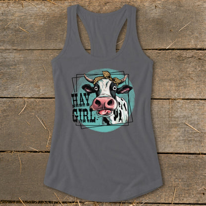 Cow with bandana and "Hay Girl" text on a grey tank top.