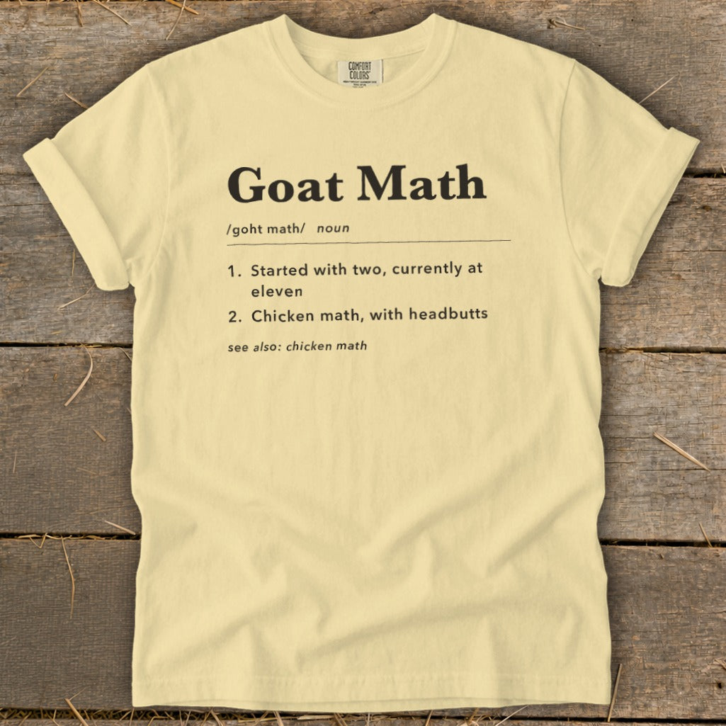 Light yellow t-shirt with "Goat Math" definition printed in black text.