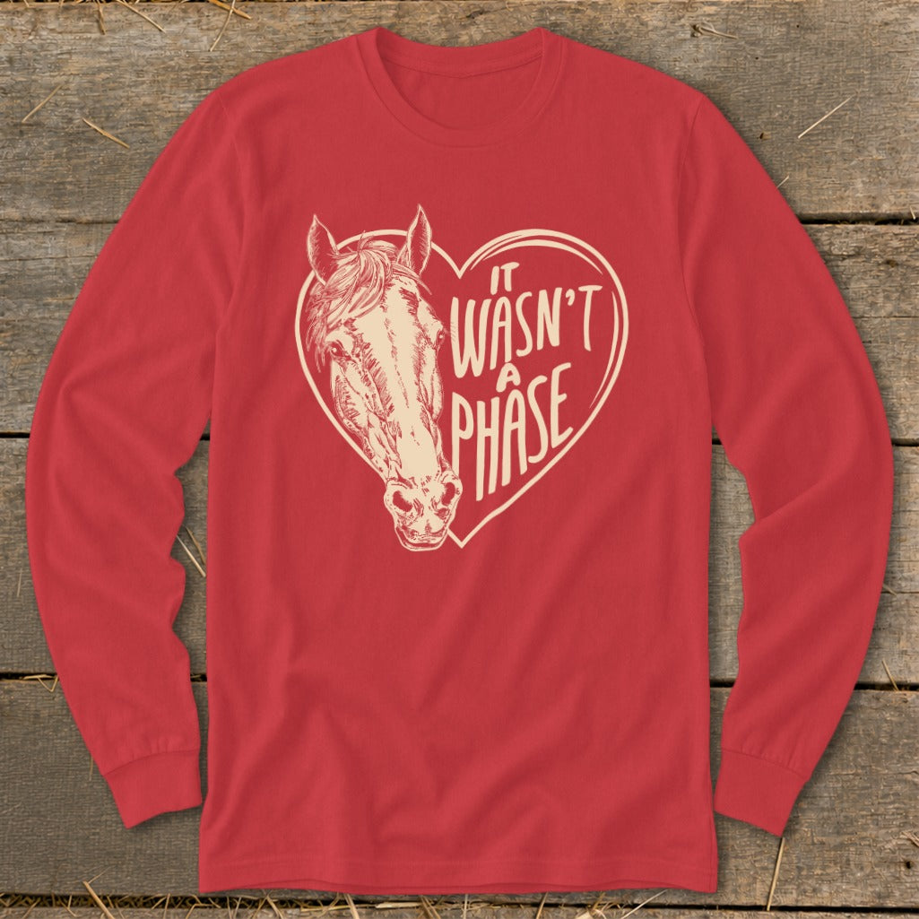 Red long sleeve shirt with a horse head inside a heart that reads "It Wasn't a Phase."