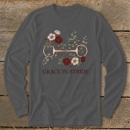 Long sleeve shirt with floral equestrian bit design and text "GRACE IN STRIDE".