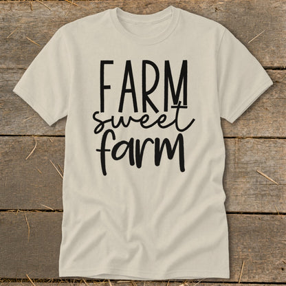 Light colored t-shirt with "FARM sweet farm" text in black lettering.