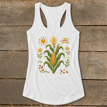 White tank top with a corn stalk, sun, and floral design.