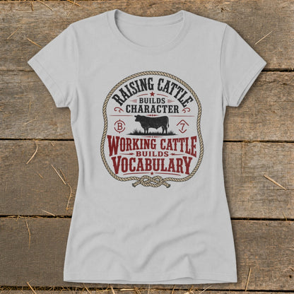 Light gray t-shirt with a circular graphic about raising and working cattle.