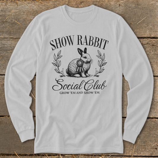 White long-sleeve shirt with "Show Rabbit Social Club" text and a rabbit illustration.