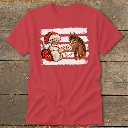 Santa booping a horse's nose with the word "Boop" in text.