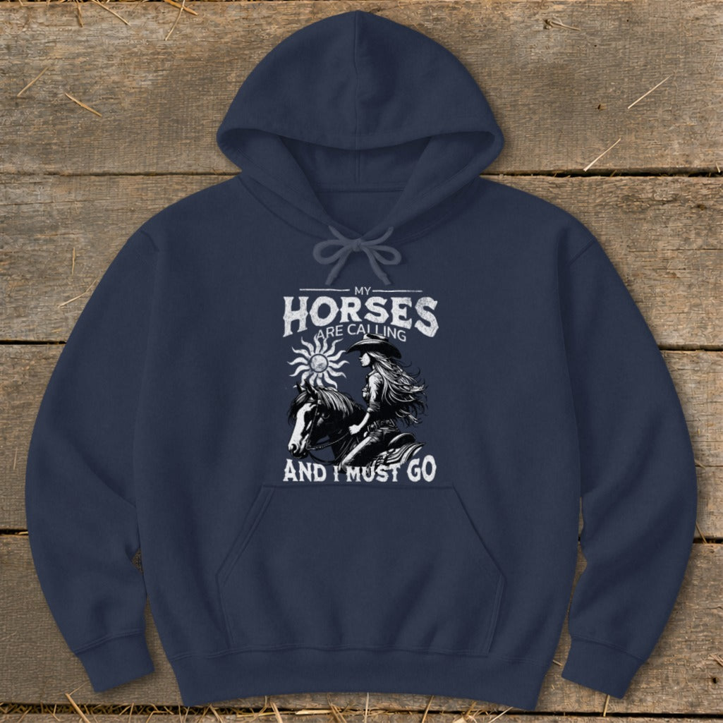 Navy hoodie with "My Horses Are Calling And I Must Go" text and a woman riding a horse.