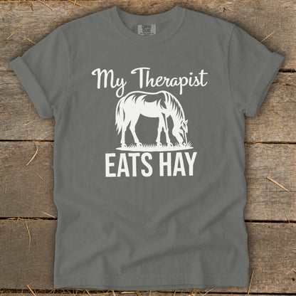 Gray t-shirt with white text "My Therapist Eats Hay" and a horse graphic.
