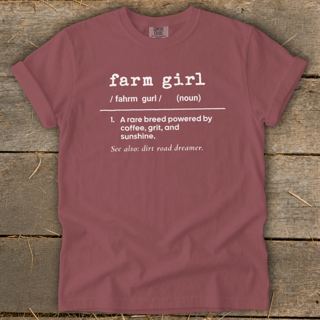 Maroon t-shirt with "farm girl" definition: powered by coffee, grit, sunshine.