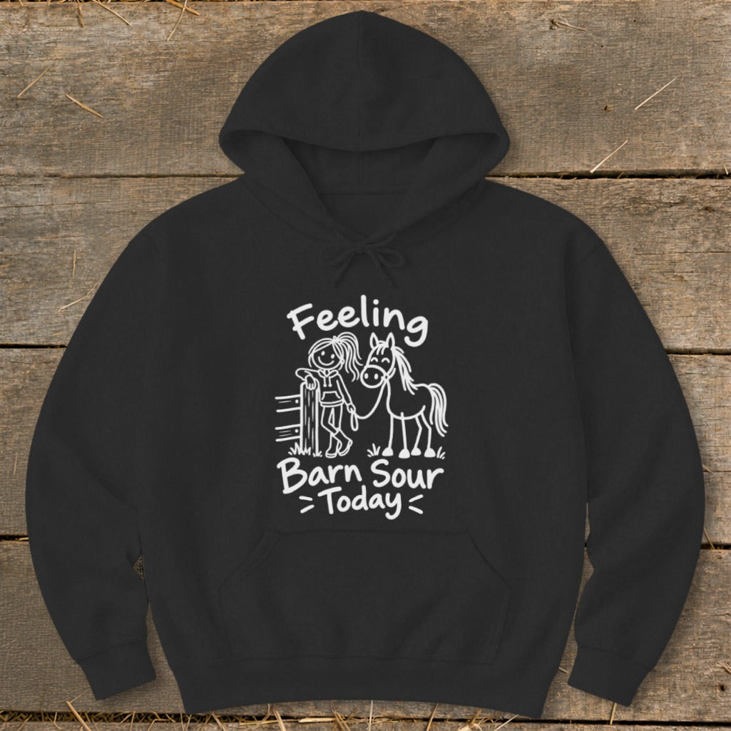 Black hoodie with white text and drawing of a person and horse, reading "Feeling Barn Sour Today".