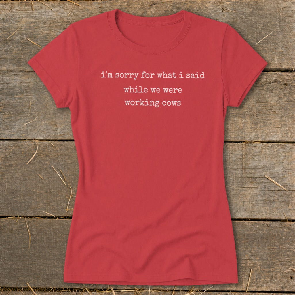 Red t-shirt with white text: "I'm sorry for what I said while we were working cows."