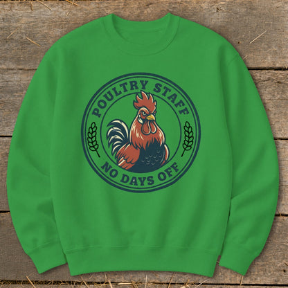 Green sweatshirt with a circular graphic featuring a rooster and text.