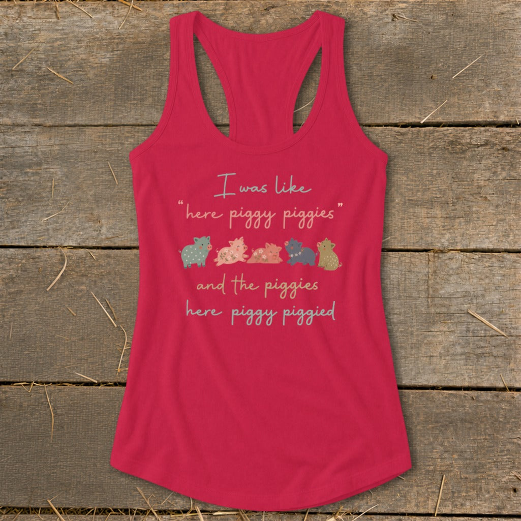 Pink tank top with text and five cartoon pigs.