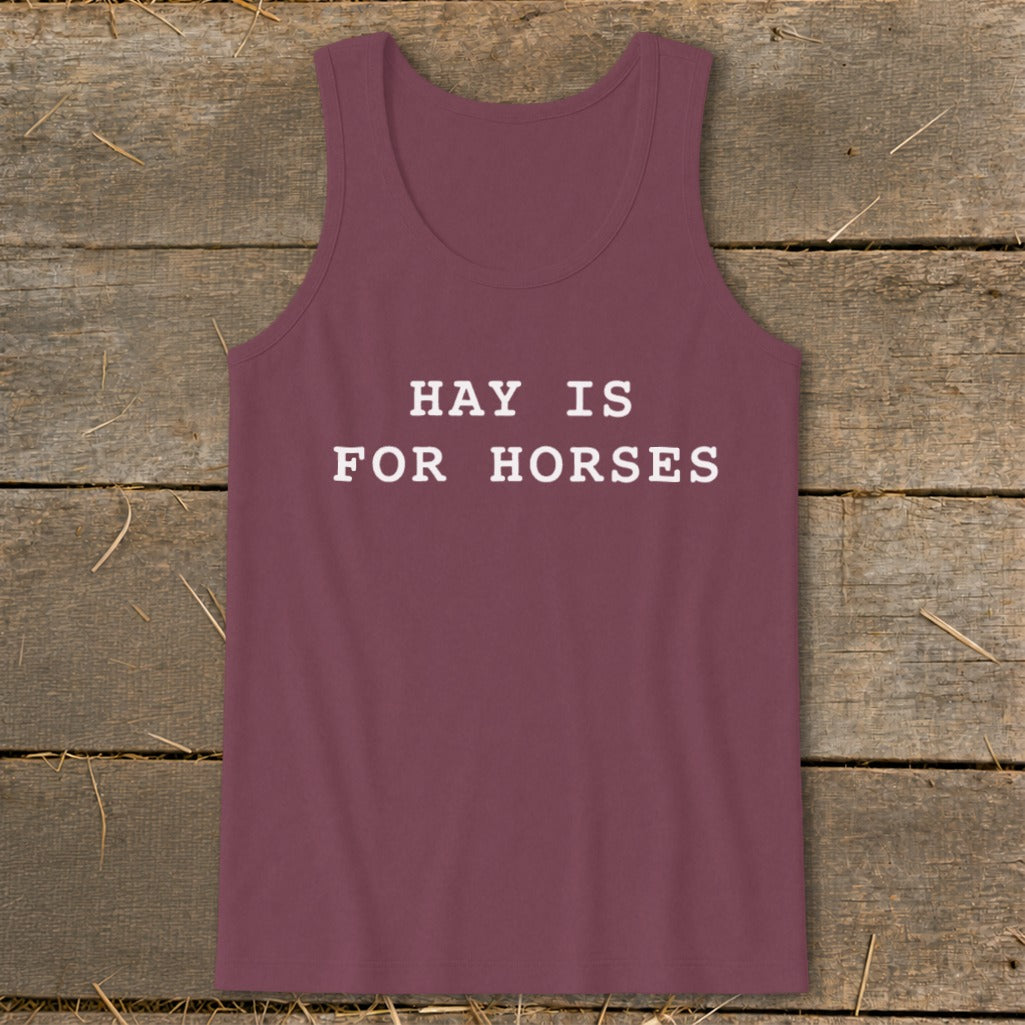 Burgundy tank top with white text that reads "HAY IS FOR HORSES".